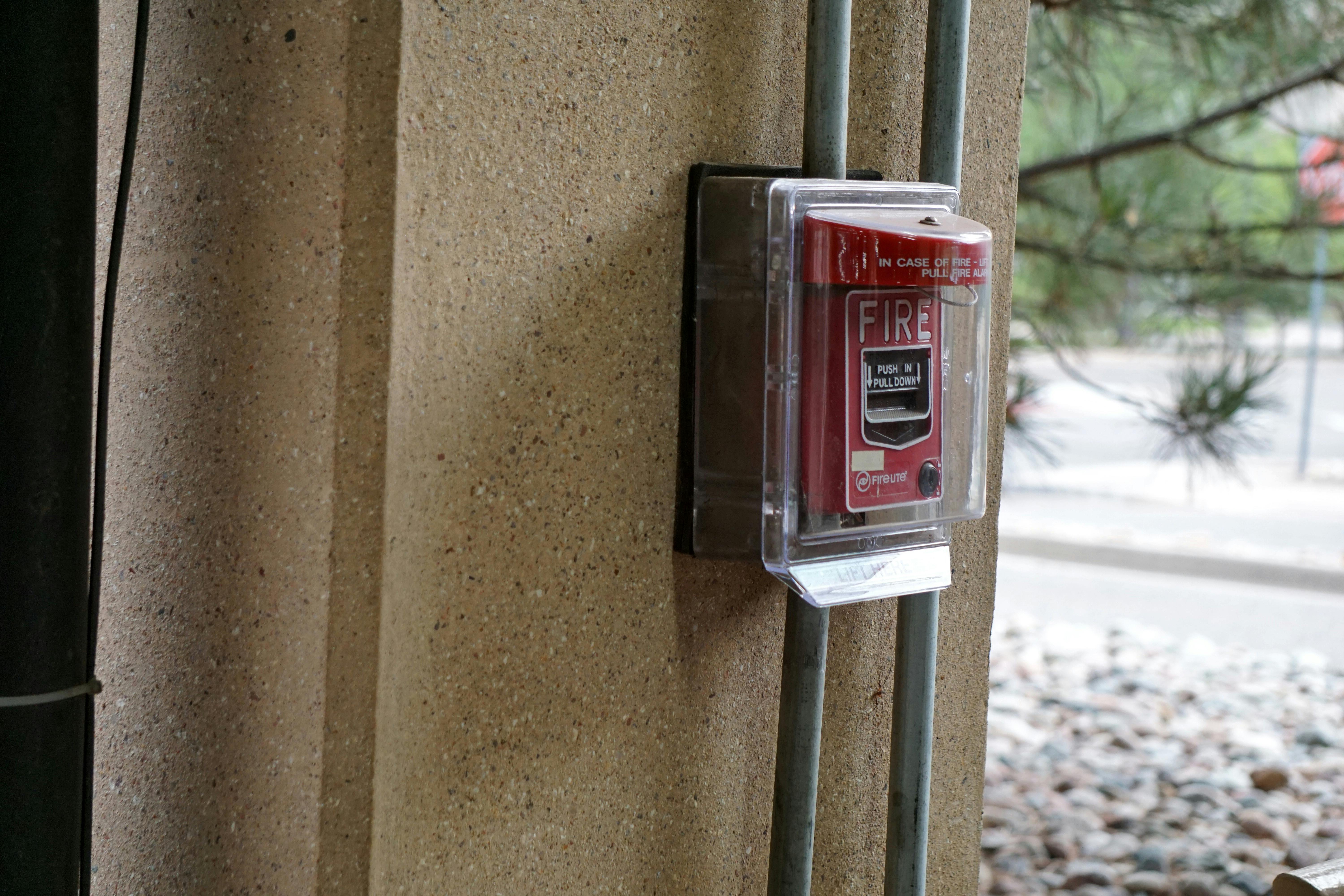 Fire alarm pull station installed on a commercial building